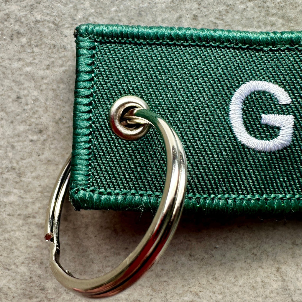 Porte‑clés Glasgow 76 — textile vert, édition rétro - Glasgow 76